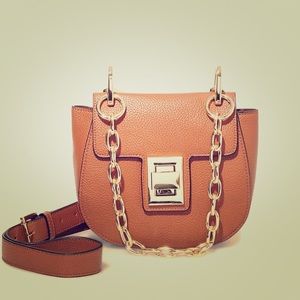 Steve Madden gold chain  crossbody/saddle bag.